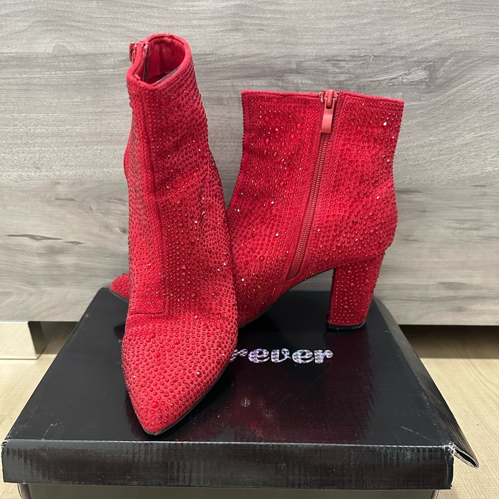 Red sparkles ankle boots. Stylish